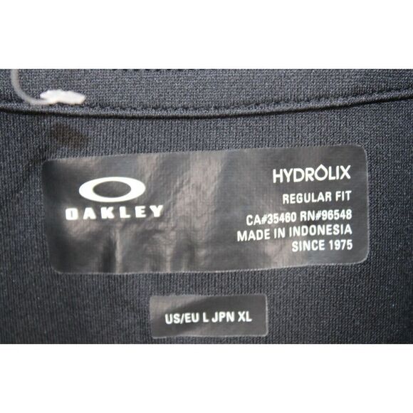 Oakley WOMEN'S Large Regular Fit Hydrolix Black Short Sleeve Golf Polo Shirt - Picture 6 of 7